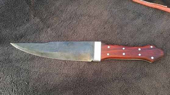 We make a durable knife from the spring (Bowie knife)