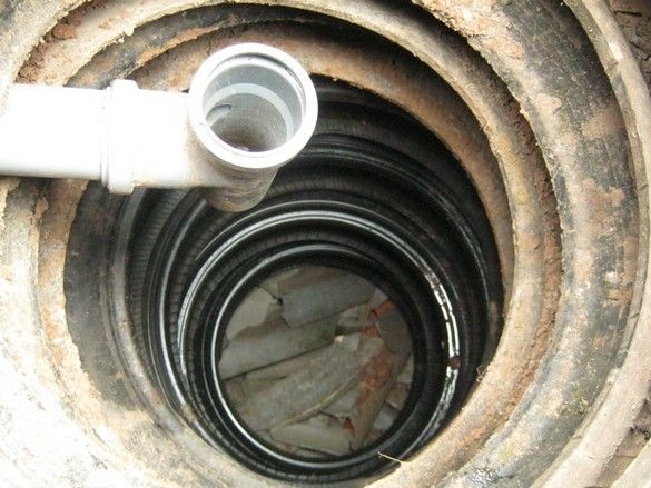 Проста филтърна ямка от автомобилни гуми за източване от пералня