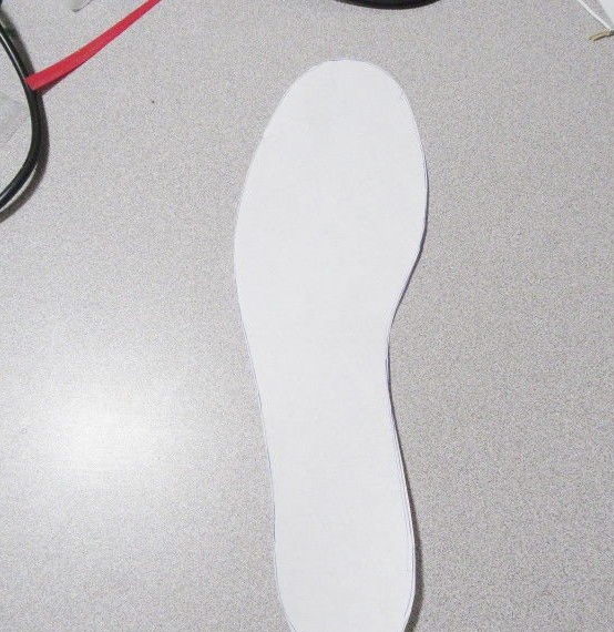 Heated insoles for a cyclist